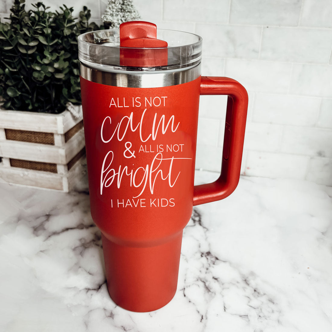 Red and green Christmas mom tumbler 40oz with all is not calm and all is not bright saying
Holiday gift tumbler for mothers featuring all is not calm and all is not bright I have kids
Christmas mom tumbler with funny quote all is not calm all is not bright I have kids 40oz